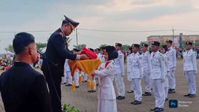 Kapolsek Maja Pimpin Upacara Penurunan Bendera HUT ke 80 RI